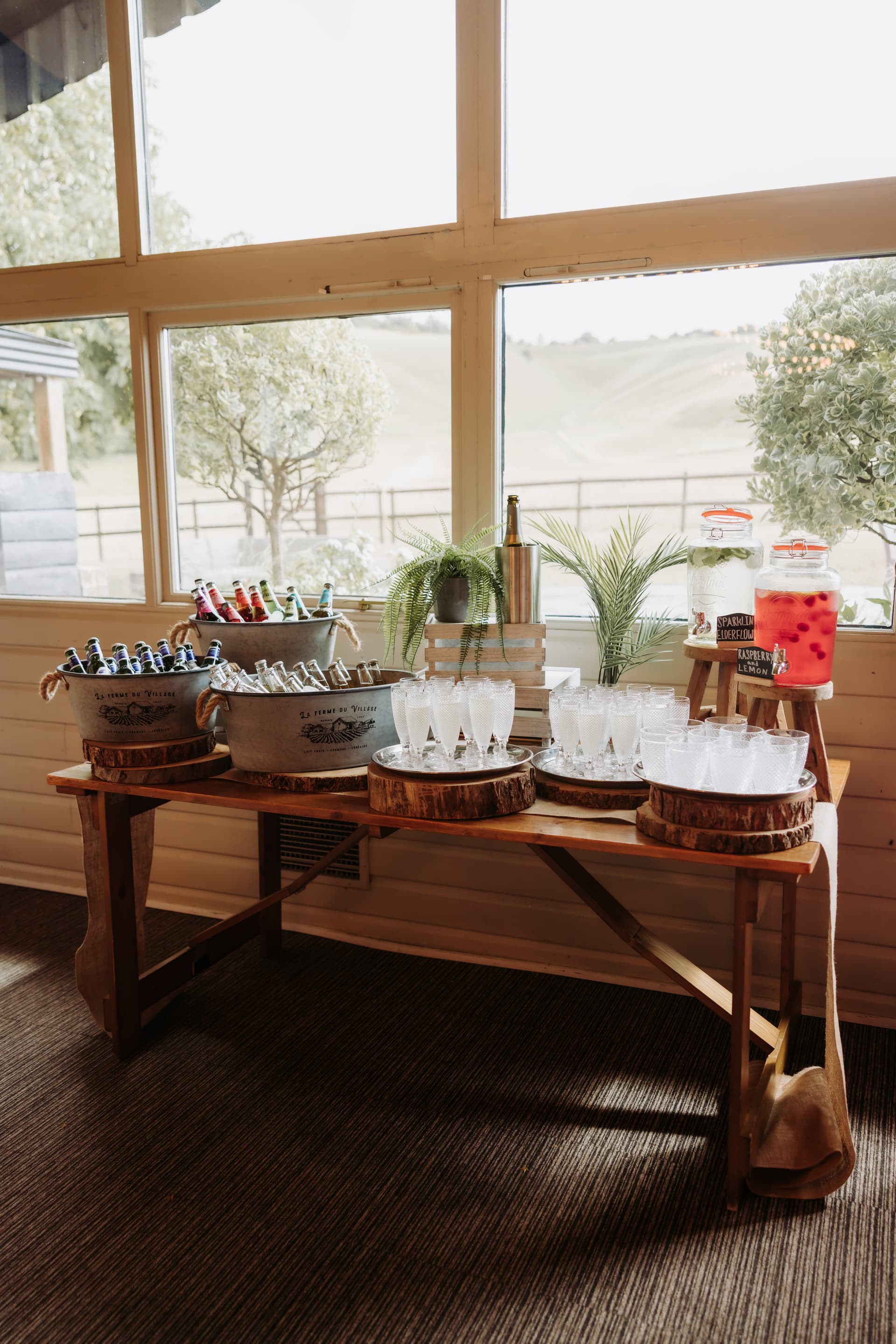 The drinks station laid out in the window light